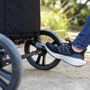 Load image into gallery viewer, Wheel brake on the Baby Trend Navigator 2-in-1 Stroller Wagon