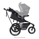 Load image into gallery viewer, Side view of the Baby Trend Expedition DLX Jogger Stroller with infant car seat attached, sold separately