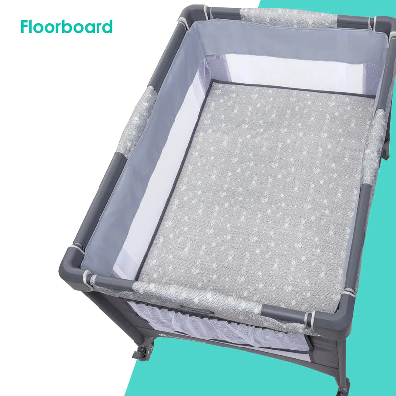 Baby Trend Nursery Suite Playard with Portable Cradle floorboard