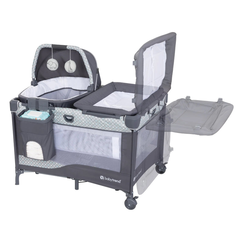 The changing table flip away on the Baby Trend Nursery Den Playard with Rocking Cradle