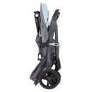 Load image into gallery viewer, Compact fold of the Baby Trend Skyline 35 Stroller Travel System