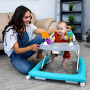 Load image into gallery viewer, Mom is watching over her child while he plays in the Smart Steps by Baby Trend Trend Activity Walker