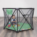 Load image into gallery viewer, A child is playing and sitting in the Baby Trend Play Zone Pop-up Play Pen