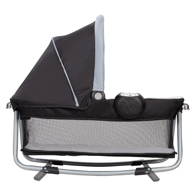 Baby Trend Retreat Nursery Center Playard includes removable rock-a-bye bassinet napper