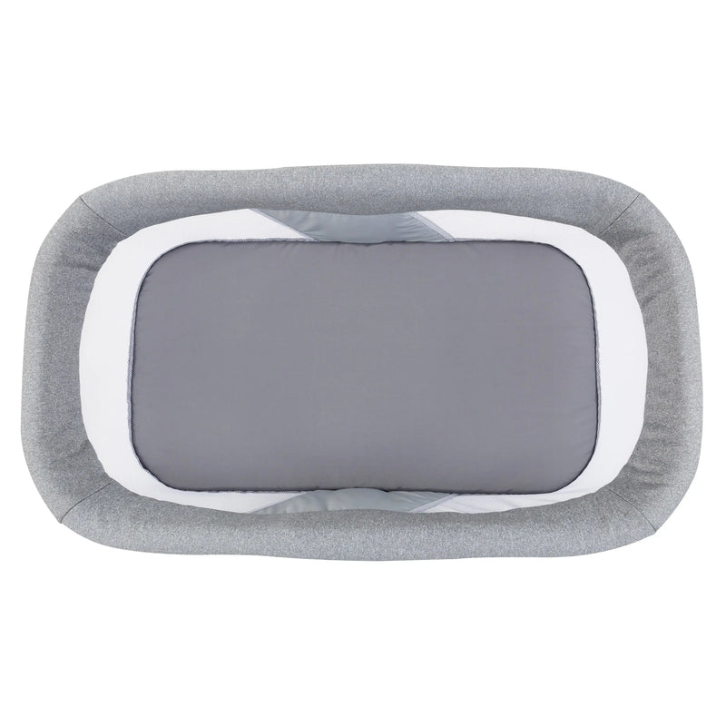 Baby Trend Quick-Fold 2-in-1 Rocking Bassinet in Shadow Stone Gray with padding