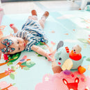 Load image into gallery viewer, Baby child is enjoying her time playing with the Smart Steps by Baby Trend Ele-fun Talk and Play STEM toy