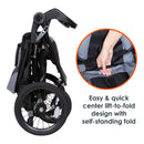 Load image into gallery viewer, Baby Trend Expedition Race Tec Plus Jogger Stroller has easy and quick center lift to fold design with self standing fold