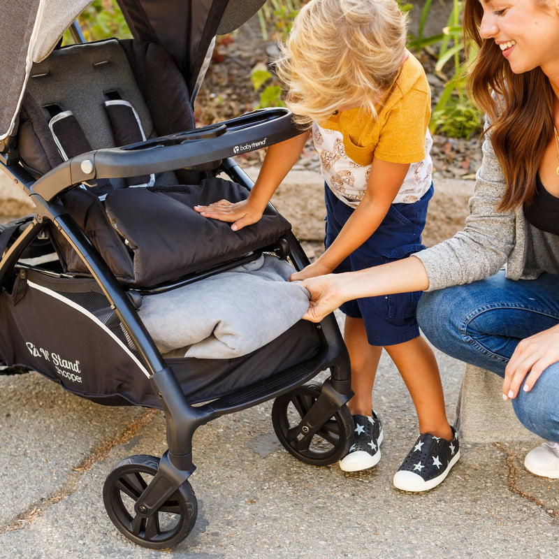 Baby Trend Sit N Stand 5-in-1 Shopper Travel System large storage basket with front access