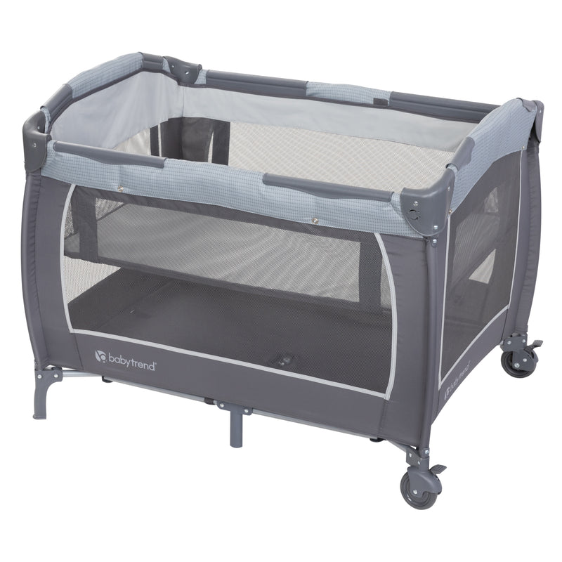 Baby Trend Lil’ Snooze Deluxe III Nursery Center Playard for Twins includes full-size bassinet