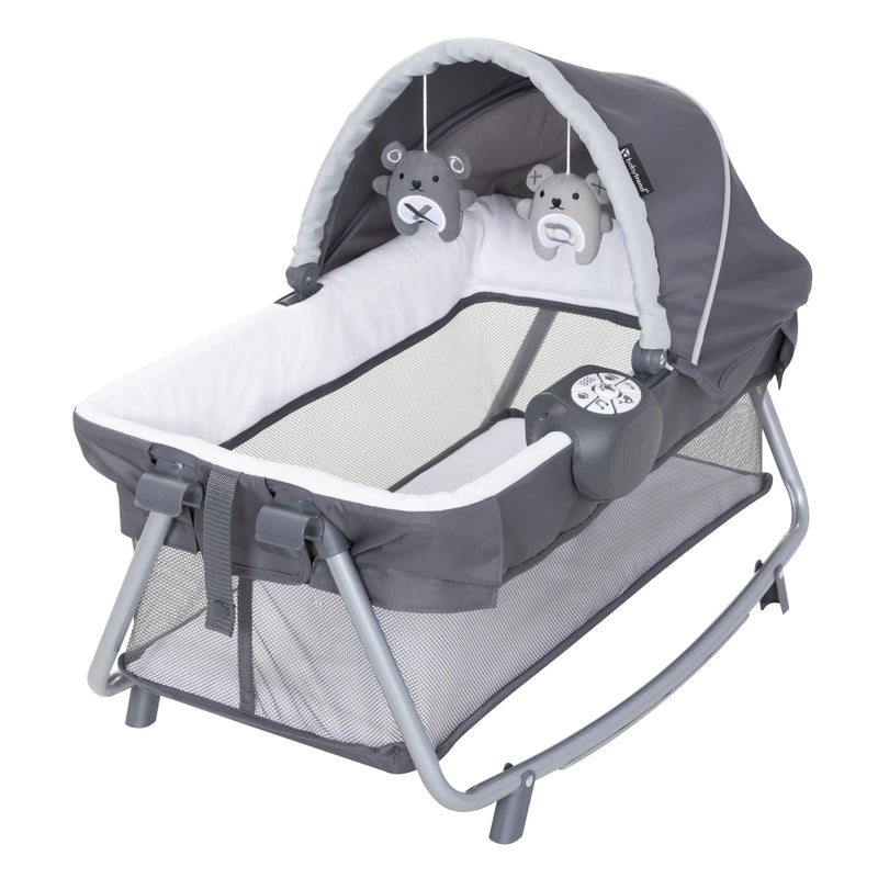 Baby Trend Lil’ Snooze Deluxe III Nursery Center Playard for Twins comes with two Rock-a-Bye Bassinet