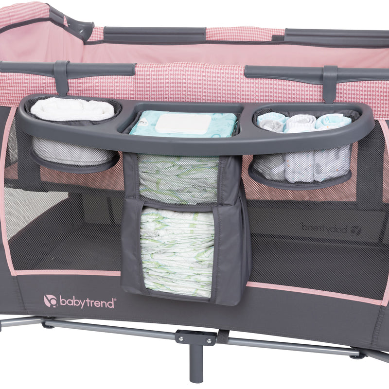 Baby Trend Lil’ Snooze Deluxe III Nursery Center Playard with deluxe parent organizer diaper stacker