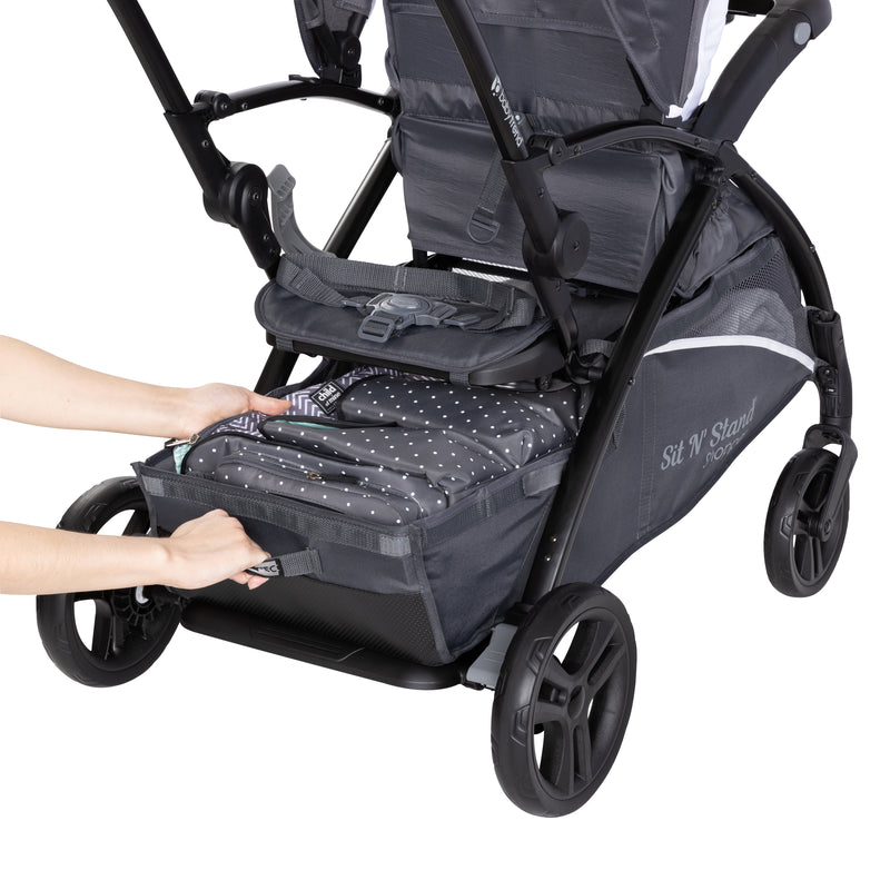 Extra large storage basket with rear access on the Baby Trend Sit N Stand 5-in-1 Shopper Stroller
