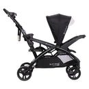 Load image into gallery viewer, Side view of the Baby Trend Sit N' Stand Double 2.0 Stroller with the rear seat as stand on platform or jump seat