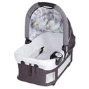 Load image into gallery viewer, Baby Trend GoLite ELX Nursery Center Playard with removable rock-a-bye bassinet and two hanging toys